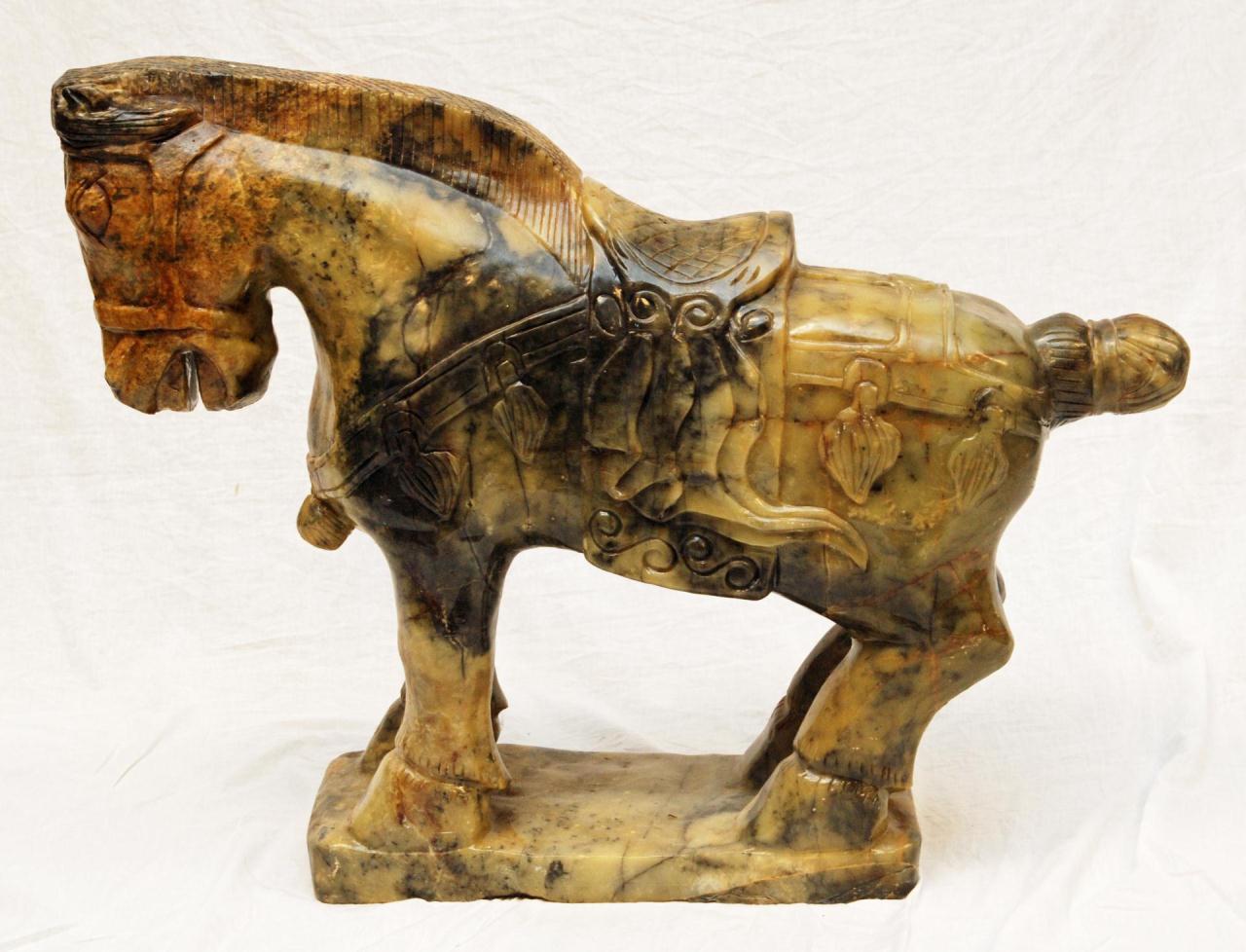 PALATIAL CARVED CHINESE JADE HORSE SCULPTUREA palatial sized Chinese carved jade standing horse