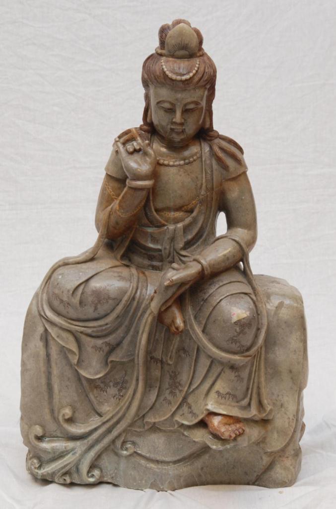 PALATIAL CHINESE STONE QUAN YIN SCULPTUREPalatial sized Chinese red and brown stone sculpture