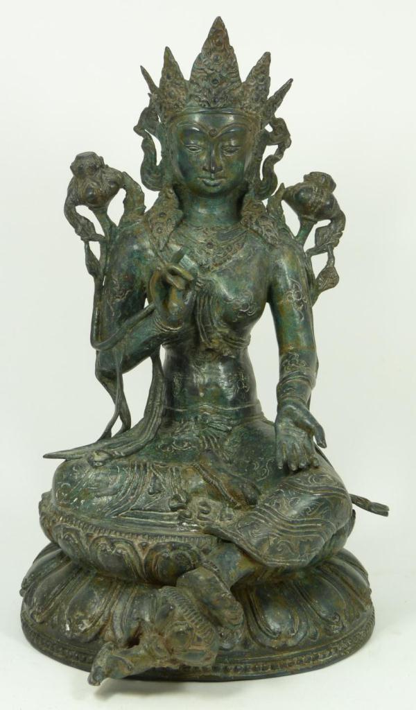 THAI BRONZE FIGURE DEPICTING A SEATED GODDESSAntique Thai bronze figure depicting a seated goddess