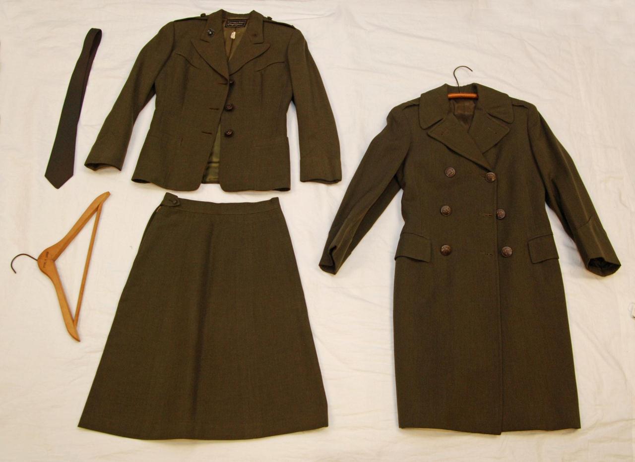 3 PIECE WORLD WAR II WOMEN`S UNIFORM 3pc World War II era women`s uniform. Includes trench coat,