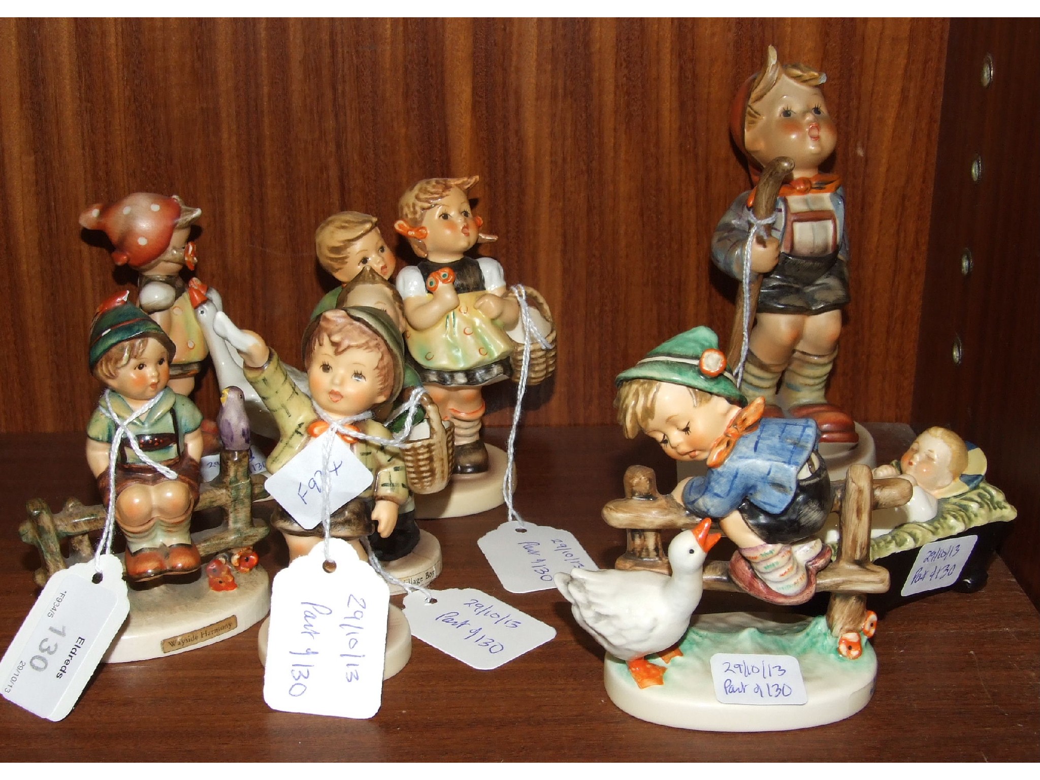 A collection of eight Goebel Hummel figures, `Goose Girl`, (a/f), `To Market`, `Come Back Soon`, `