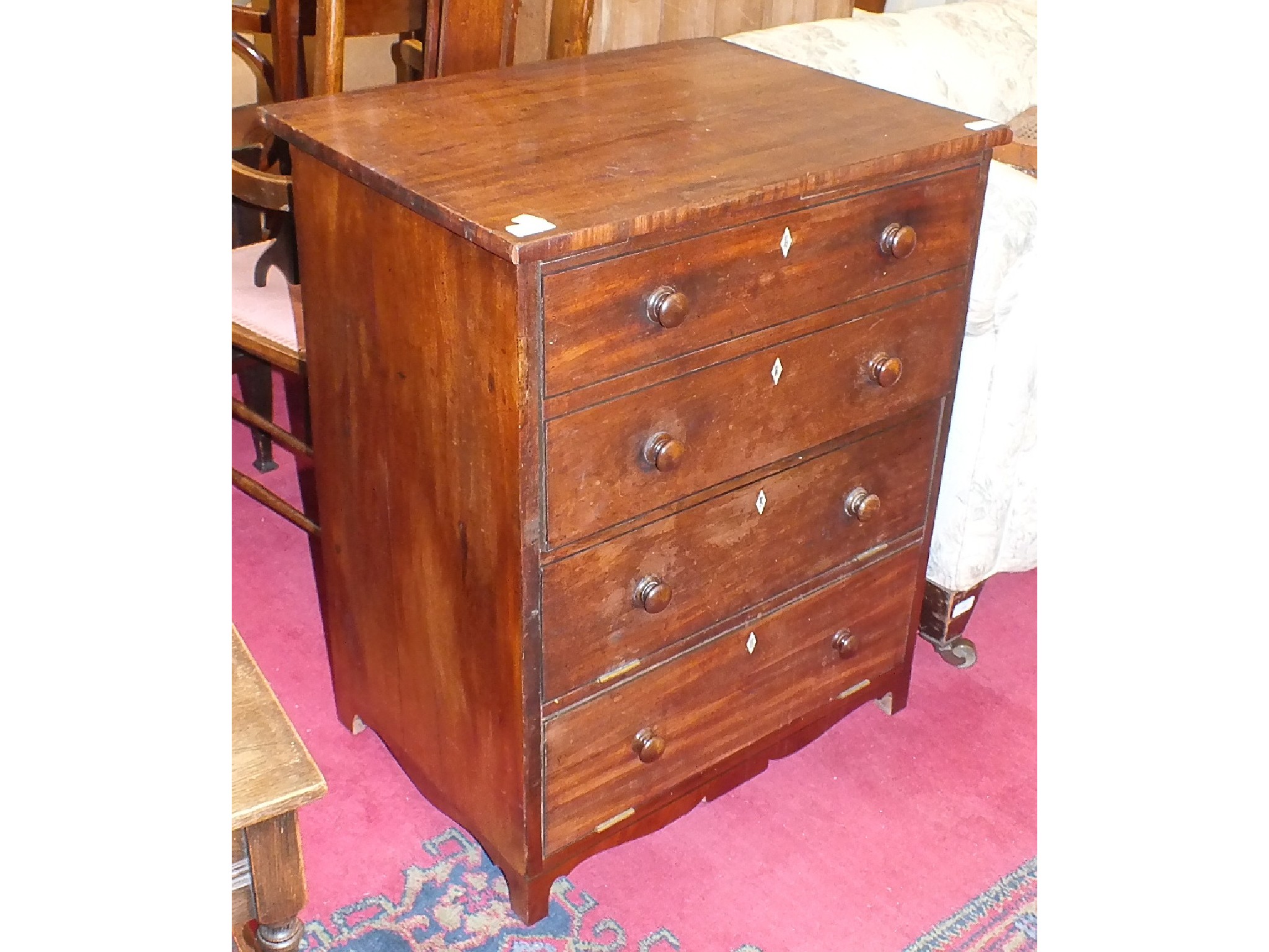 A Georgian mahogany commode of four false drawers, converted as a television cabinet, 64cm wide.