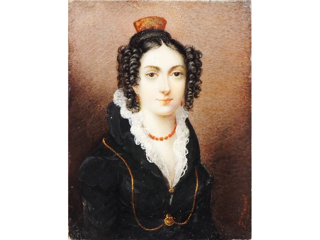 A portrait miniature painted on ivory of a young woman, c1820`s, in black dress with lace collar,