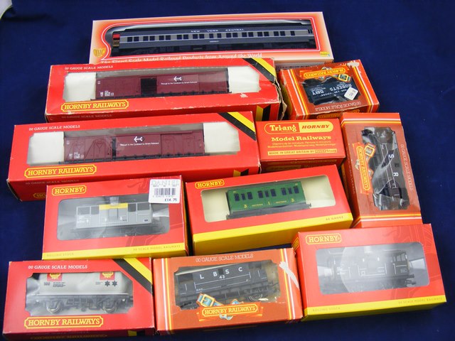 A carton containing 10 boxed Hornby Train wagons to include R738 x2, R4121, R6412, R020, R6434,