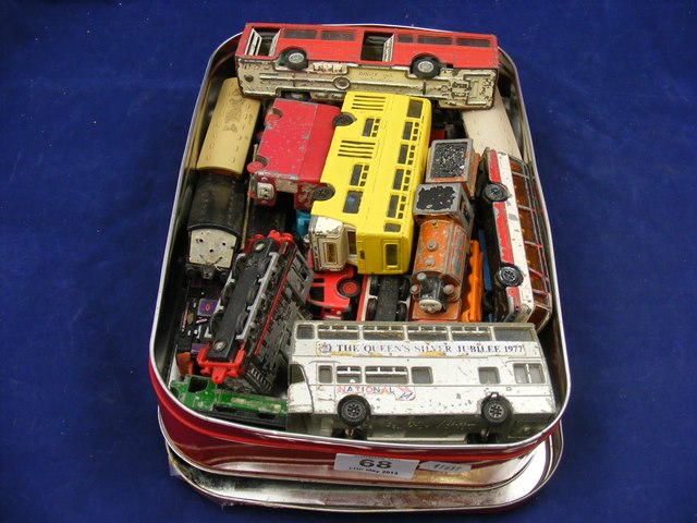 A qty of playworn dinky buses and Thomas the Tank engine playworn toys