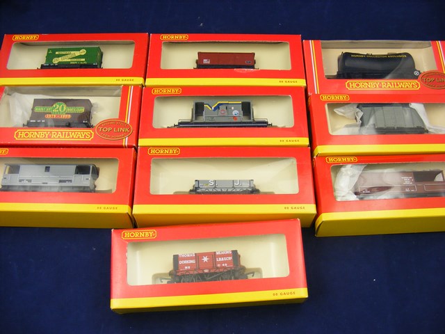 A carton containing 10 boxed Hornby train wagons to include R6036, R6267, R6113, R6133, R6090,