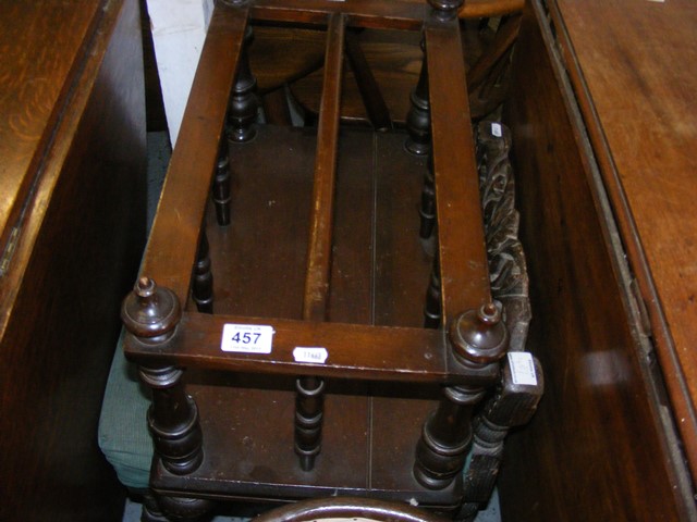 A magazine rack together with an early stool with barley twist legs