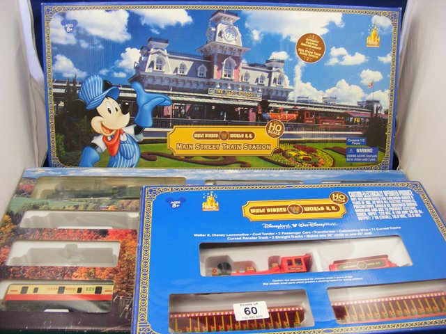 A boxed Disney World Theme park collection Walter E Disney loco and carriages, boxed mainstreet