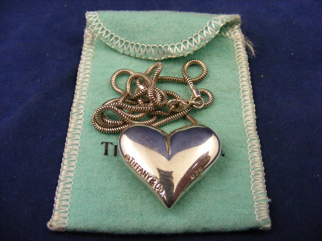 Genuine Tiffany and Co heart silver necklace est.