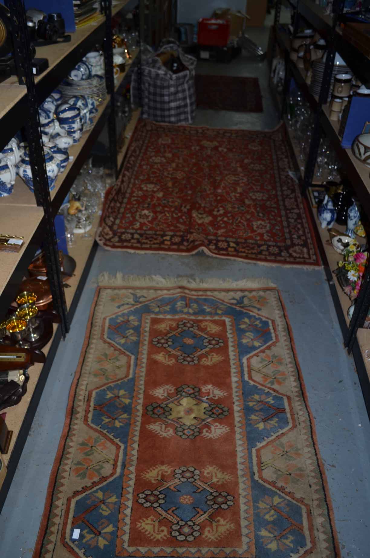 Afghan Geometric red ground rug (58" x 38") and two other rugs