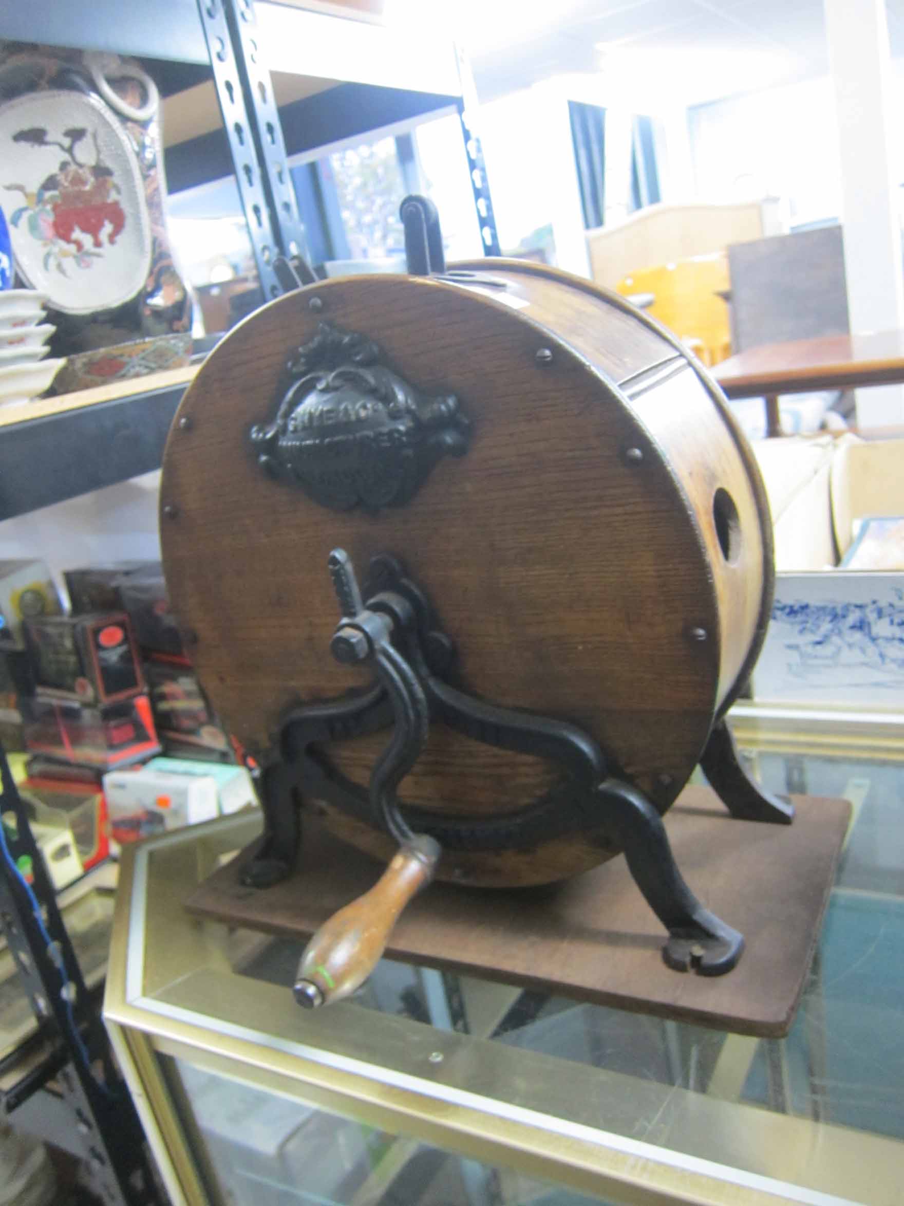 Victorian oak rotating knife cleaner on metal supports