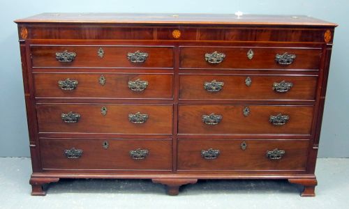 19th century mahogany double chest with a hinged top above four faux drawers, four long drawers