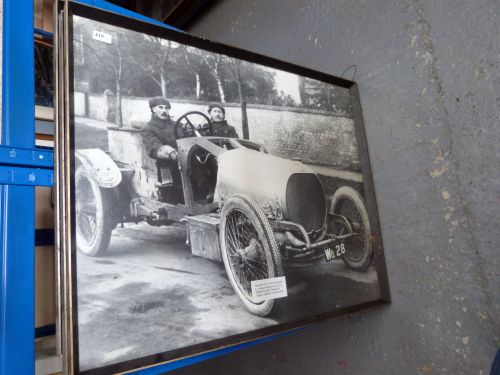 Three large black and white framed photographs including vintage car