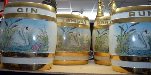 Set of four edwardian spirit barrels each with swan decoration and other ceramics