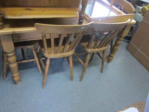 Pine table and six chairs,