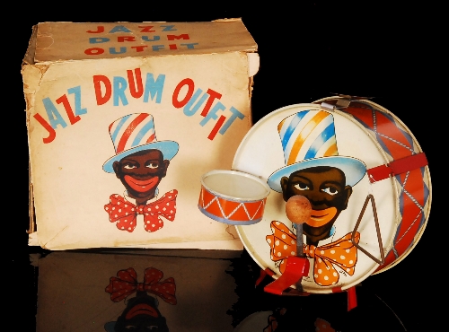 Black Americana - Toby Toys - A 1920s to 30s tin plate `Jazz Drum Outfit` transfer printed with an