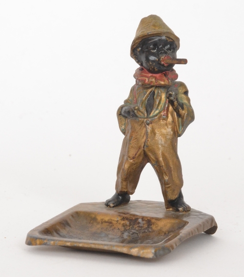 Black Memorabilia - A 1930s Austrian cold painted novelty spelter ash tray in the form of a young