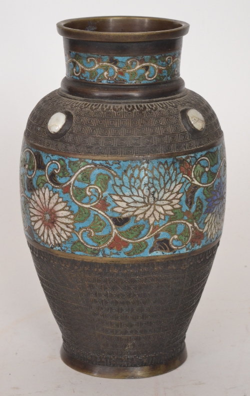 An early 20th Century Chinese cloisonne vase of baluster form, decorated with chrysanthemums on a