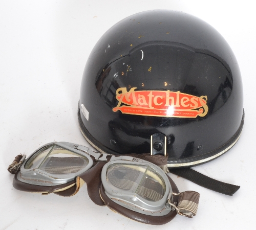 A Matchless motorcycle helmet with side protectors and aluminium framed and leather padded