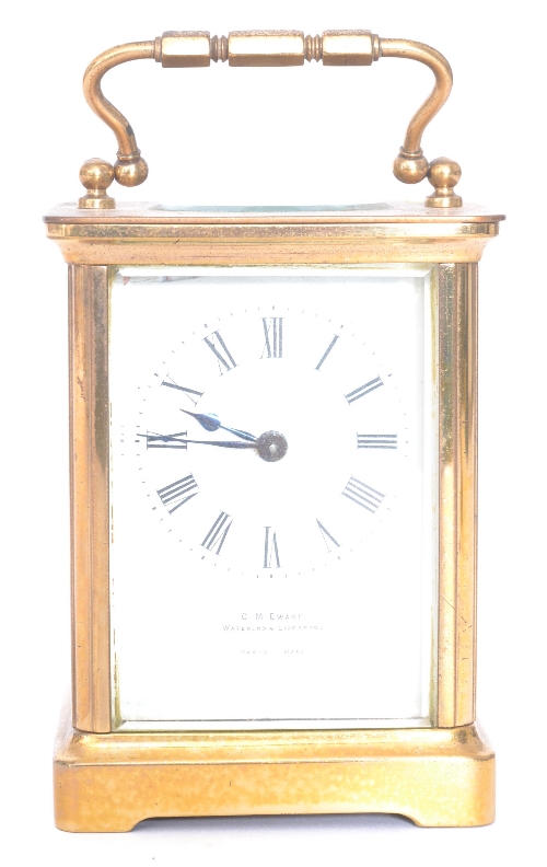 A 20th Century French brass carriage clock, white painted enamelled dial, retailed by C M Ewart