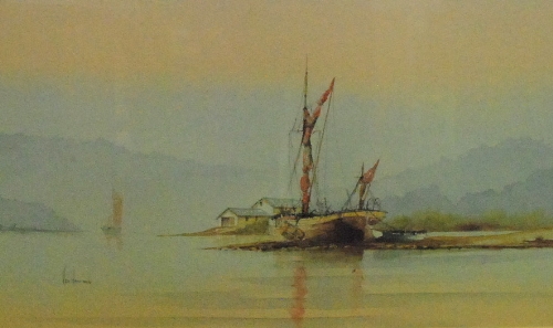 KEN HAMMOND (CONTEMPORARY) - A moored sailing barge, watercolour, signed, 30cm x 51cm.