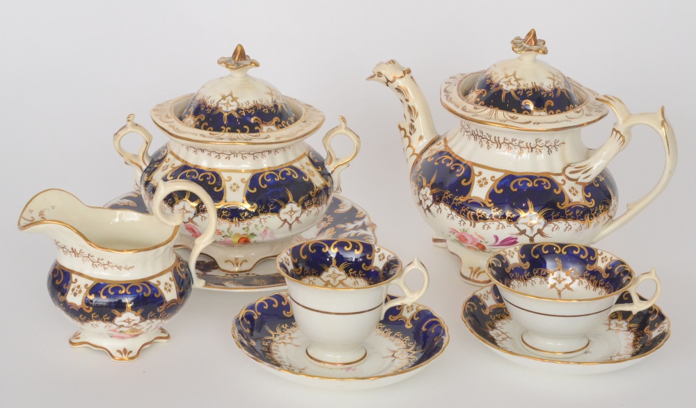 A 19th Century part teaset in the style of Coalport comprising teapot, slop bowl, large sucrier,