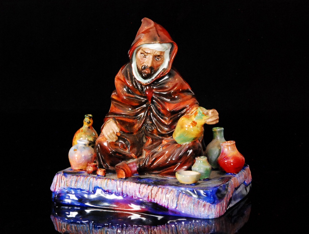 A Royal Doulton figurine entitled The Potter. S/D