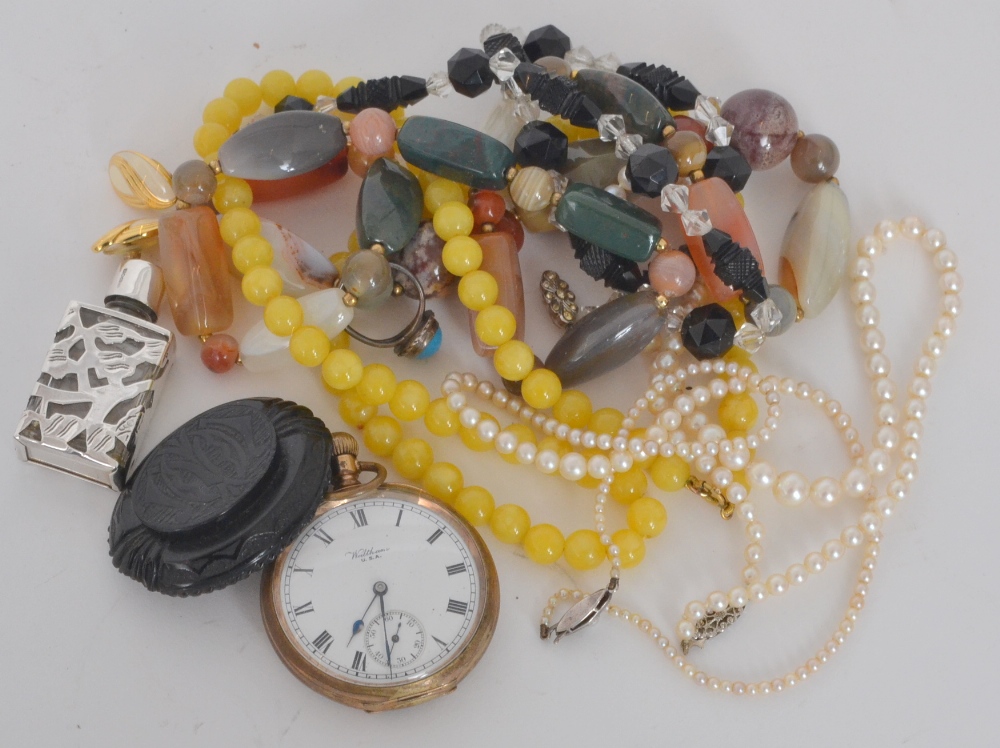 A small parcel lot costume jewellery to include jet brooch, plated pocket watch, modern silver scent