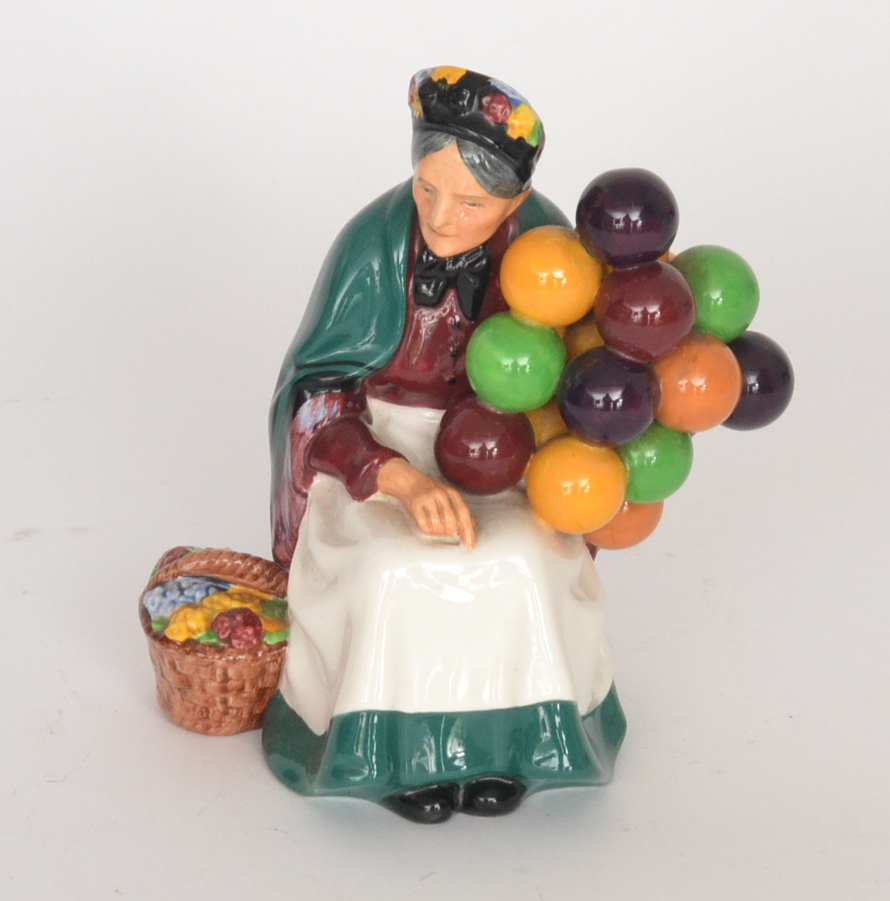 A Royal Doulton figurine entitled The Old Balloon Seller HN1315.