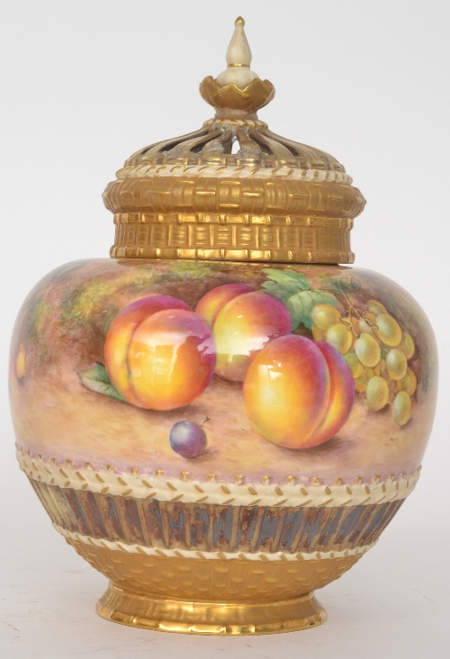 A large Royal Worcester pot pourri and spire cover decorated with a continuous band of handpainted