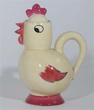 A Clarice Cliff Chick Coco pot circa 1934 with pink beak and feathers together with a similar beaker