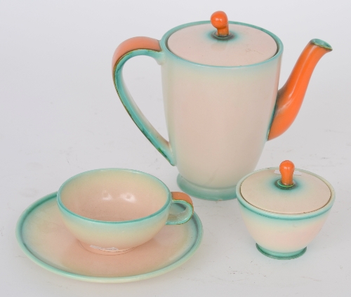 A 1930`s Art Deco coffee set comprising coffee pot, six coffee cans and saucers, milk jug,