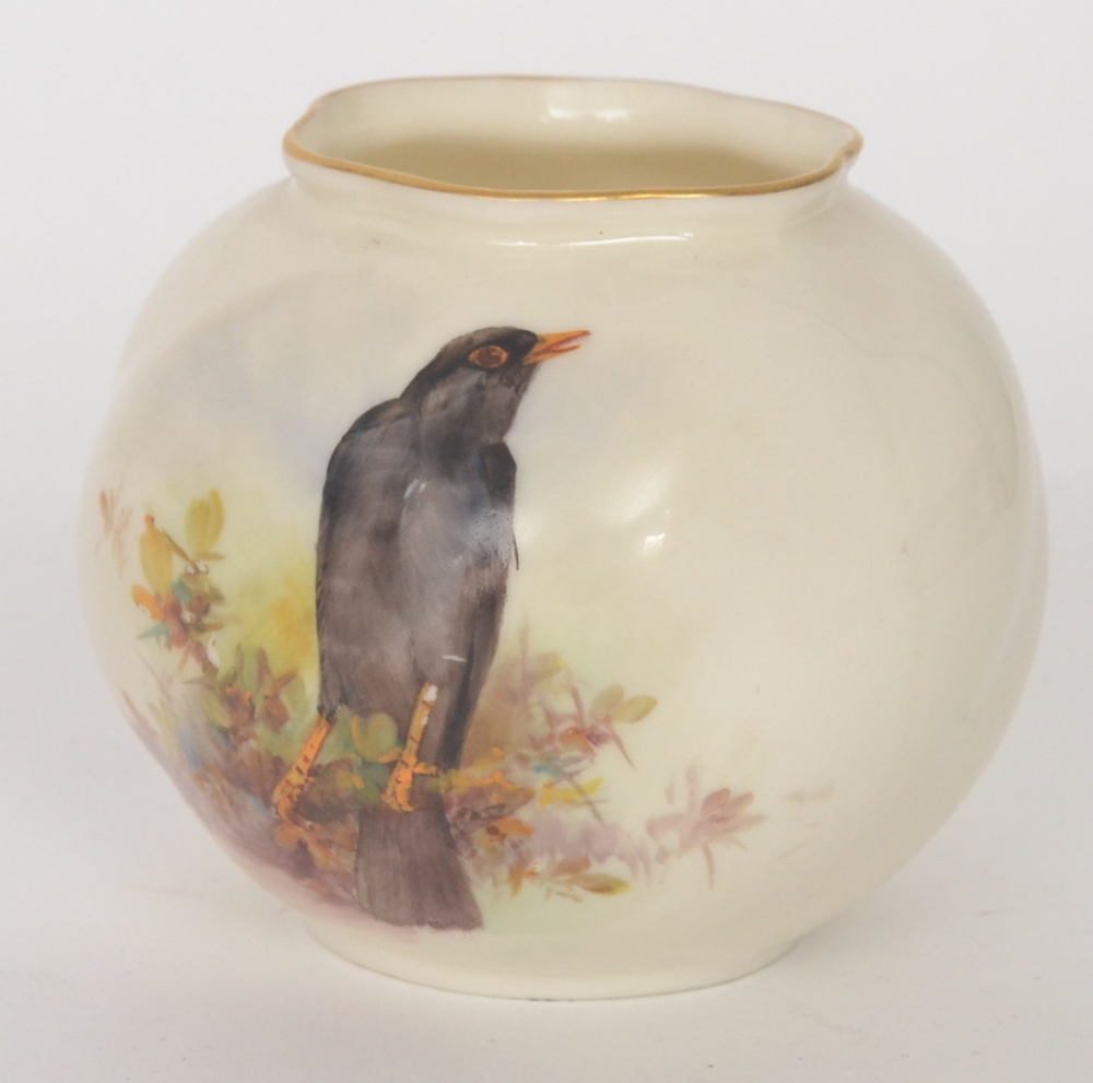 A Royal Worcester Graingers shape 161 cache pot decorated with a handpainted blackbird perched
