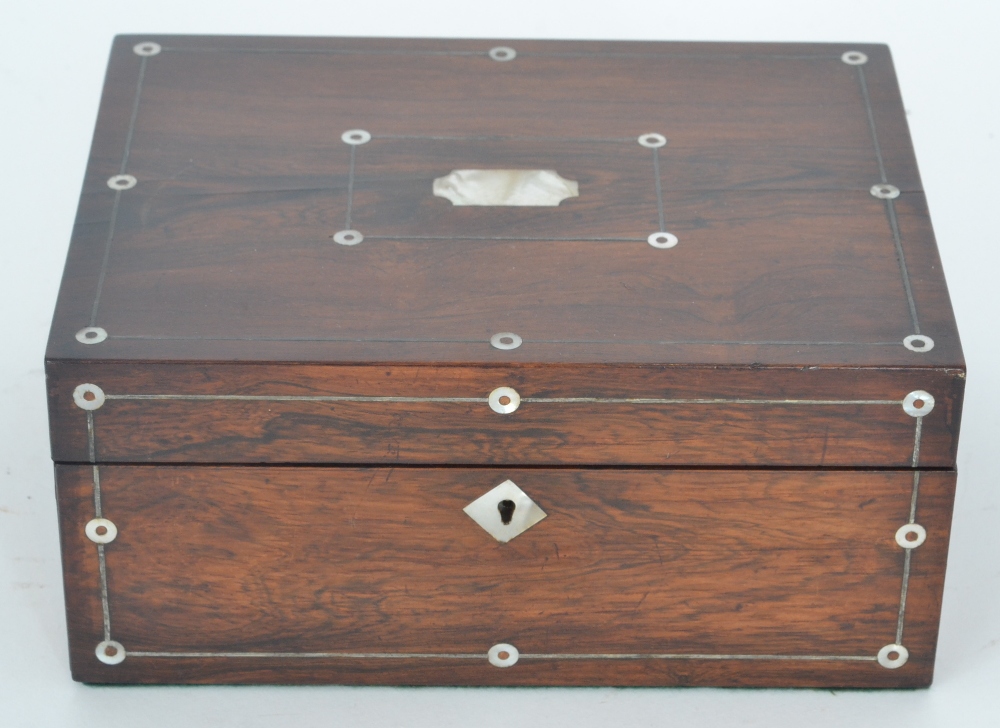 A 19th Century mother of pearl inlaid rosewood jewellery box, fitted divisioned tray and further