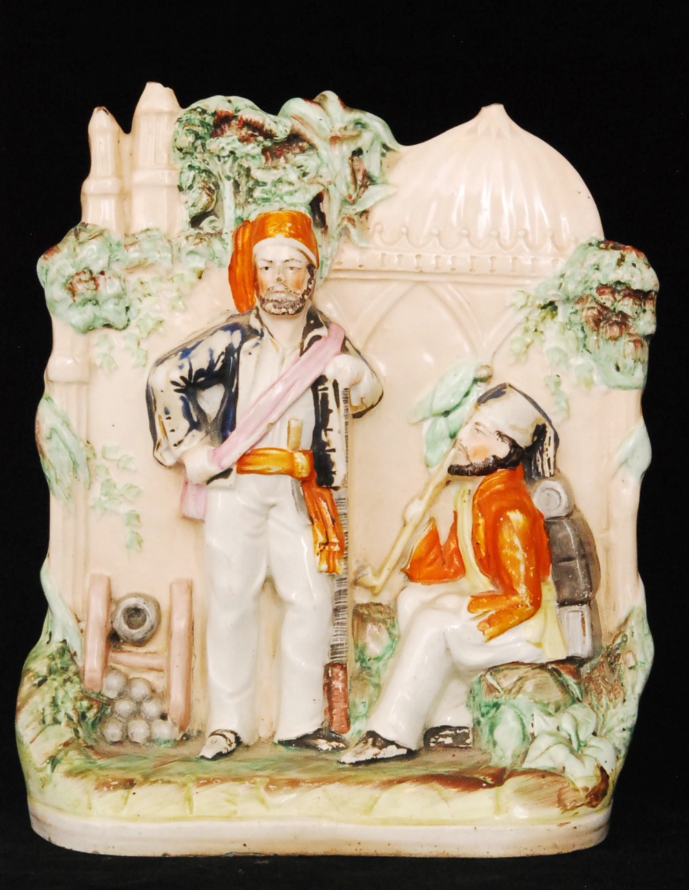 A 19th Century Crimean War Staffordshire flatback depicting two soldiers each wearing fezzes, one