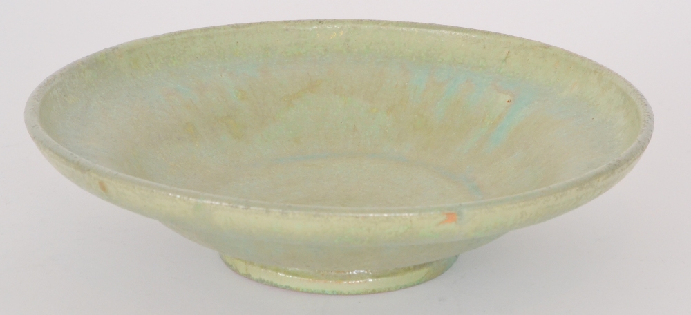 A French 1930`s bowl by Jean Garillon decorated in a green crystalline glaze, impressed marks to