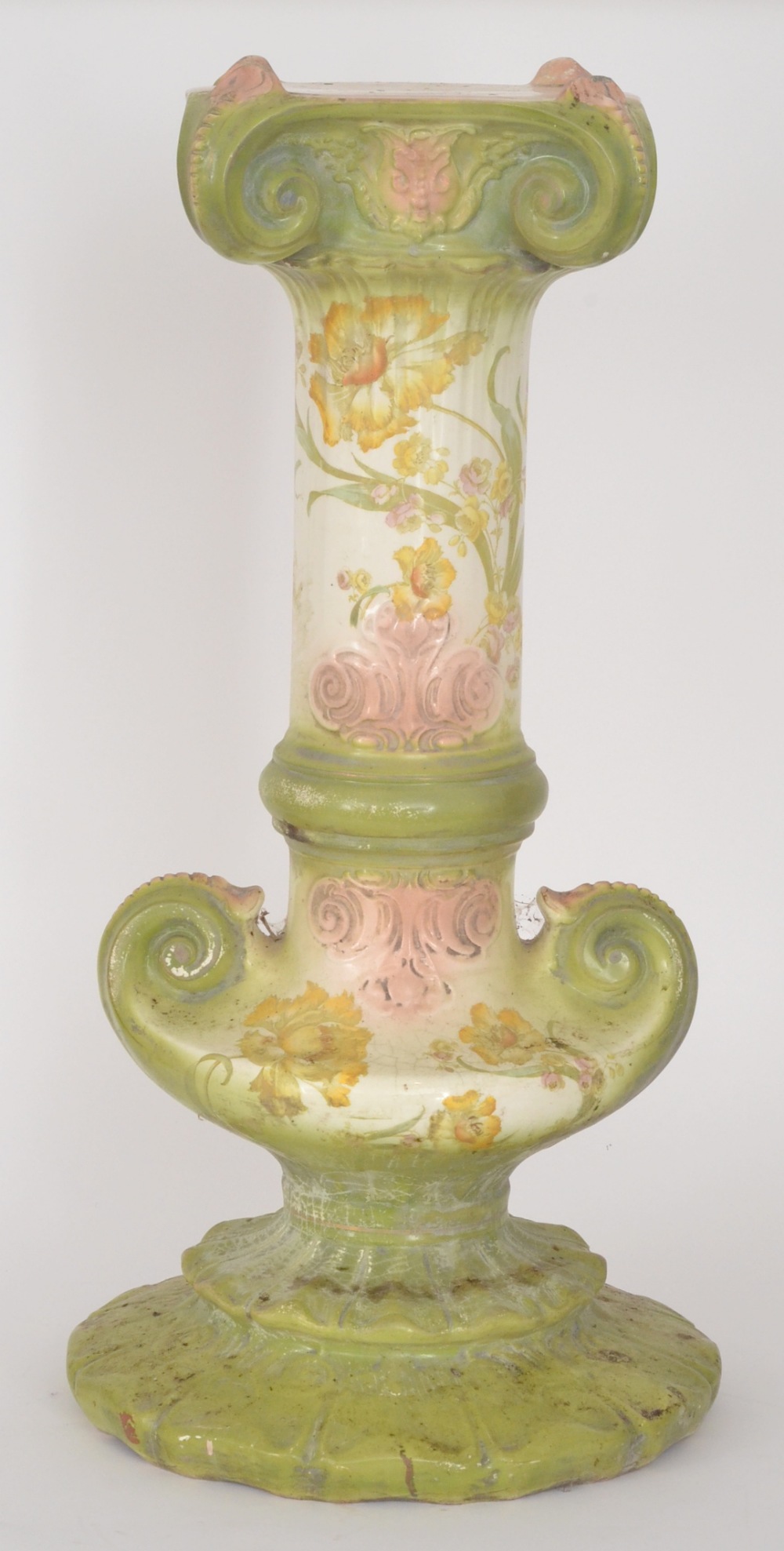 A late 19th Century jardiniere pedestal decorated with large yellow flower heads against an off