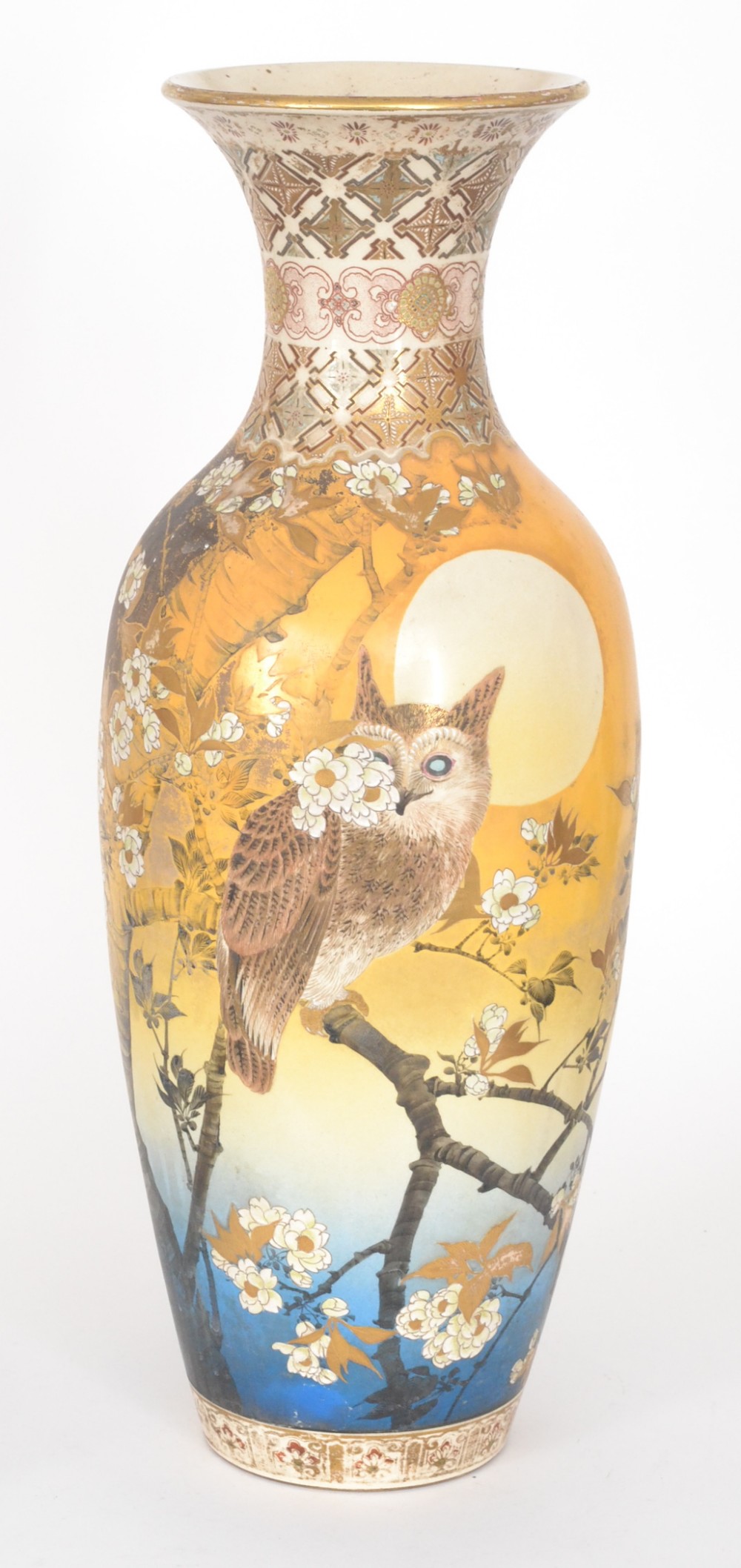 A large late 19th Century to early 20th Century Japanese baluster vase decorated with an owl perched