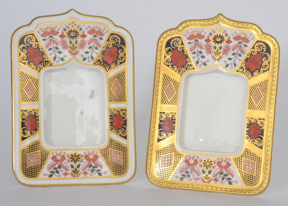 A matched pair of Royal Crown Derby photograph frames decorated in the Imari palete, pattern 1128,