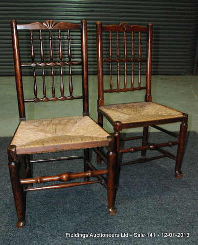 A harlequin set of six North Counties ash spindle back dining chairs, shaped and carved fan top