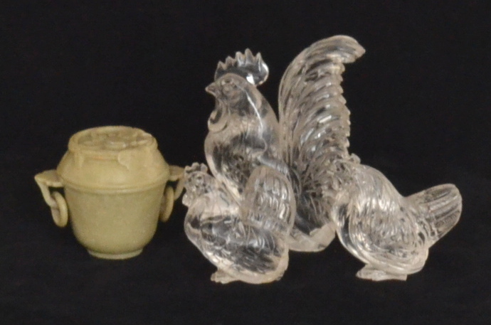 A Chinese graduated set of six green hardstone small measures all within a twin handled cup and