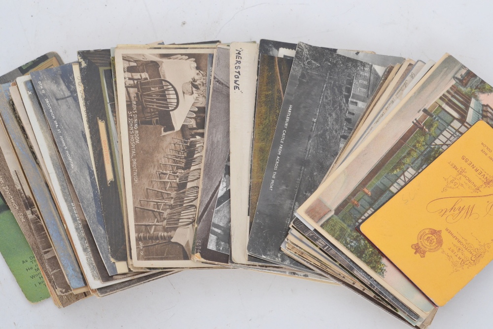 A collection of loose postcards, to include remembrance, Yorkshire and assorted photographs