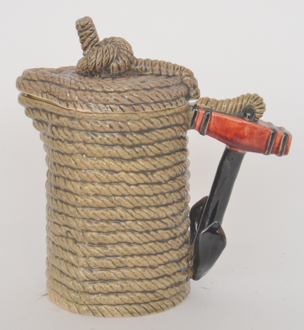 A 19th Century Staffordshire maritime water jug, the body and cover formed as coiled rope with an