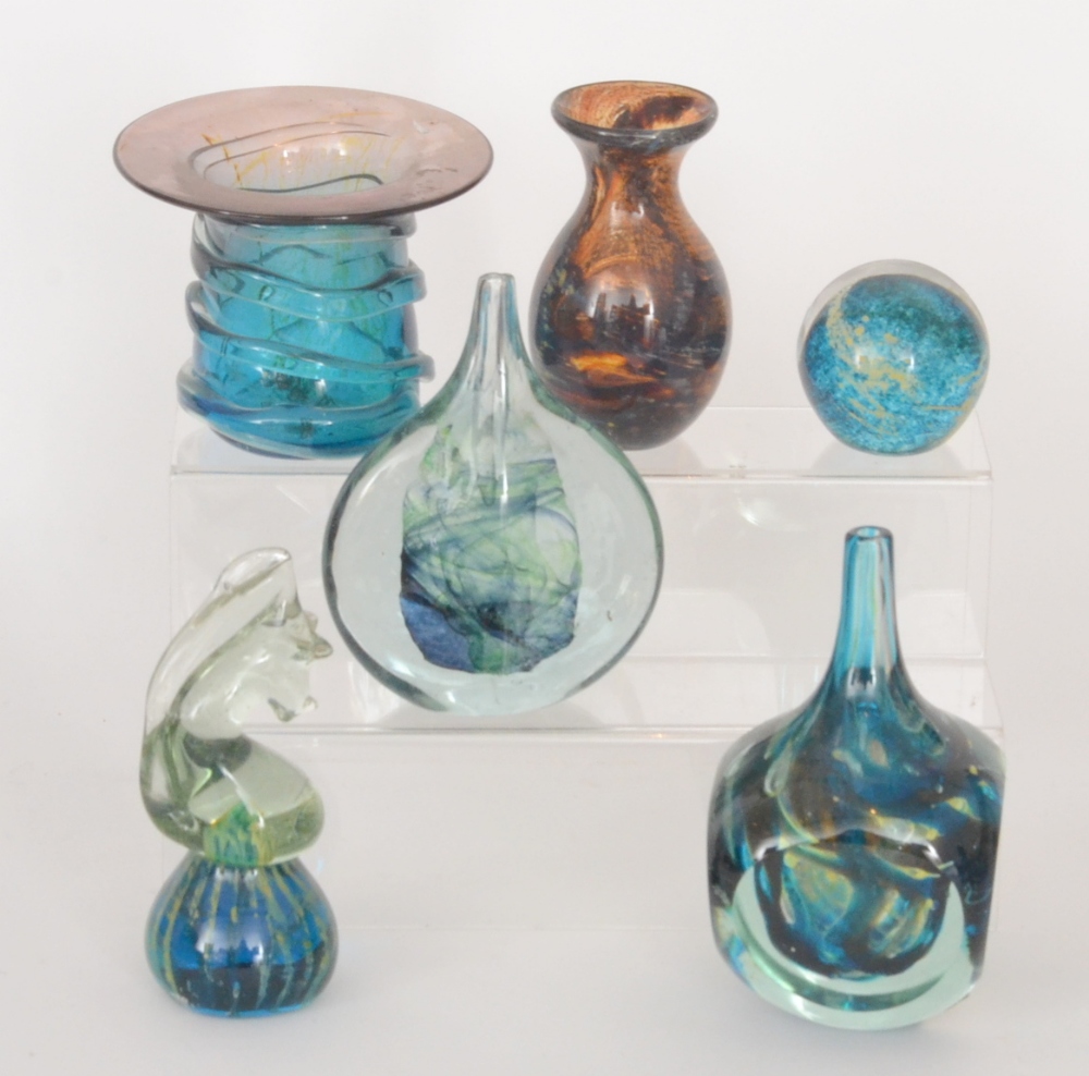 A small assorted collection of Mdina glass to include a cut ice lollipop vase, paperweight, ovoid