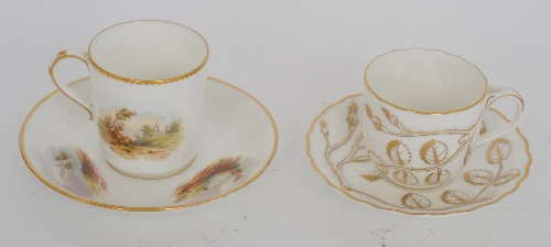 A 19th Century cup and saucer painted with river landscapes to a white ground, together with a