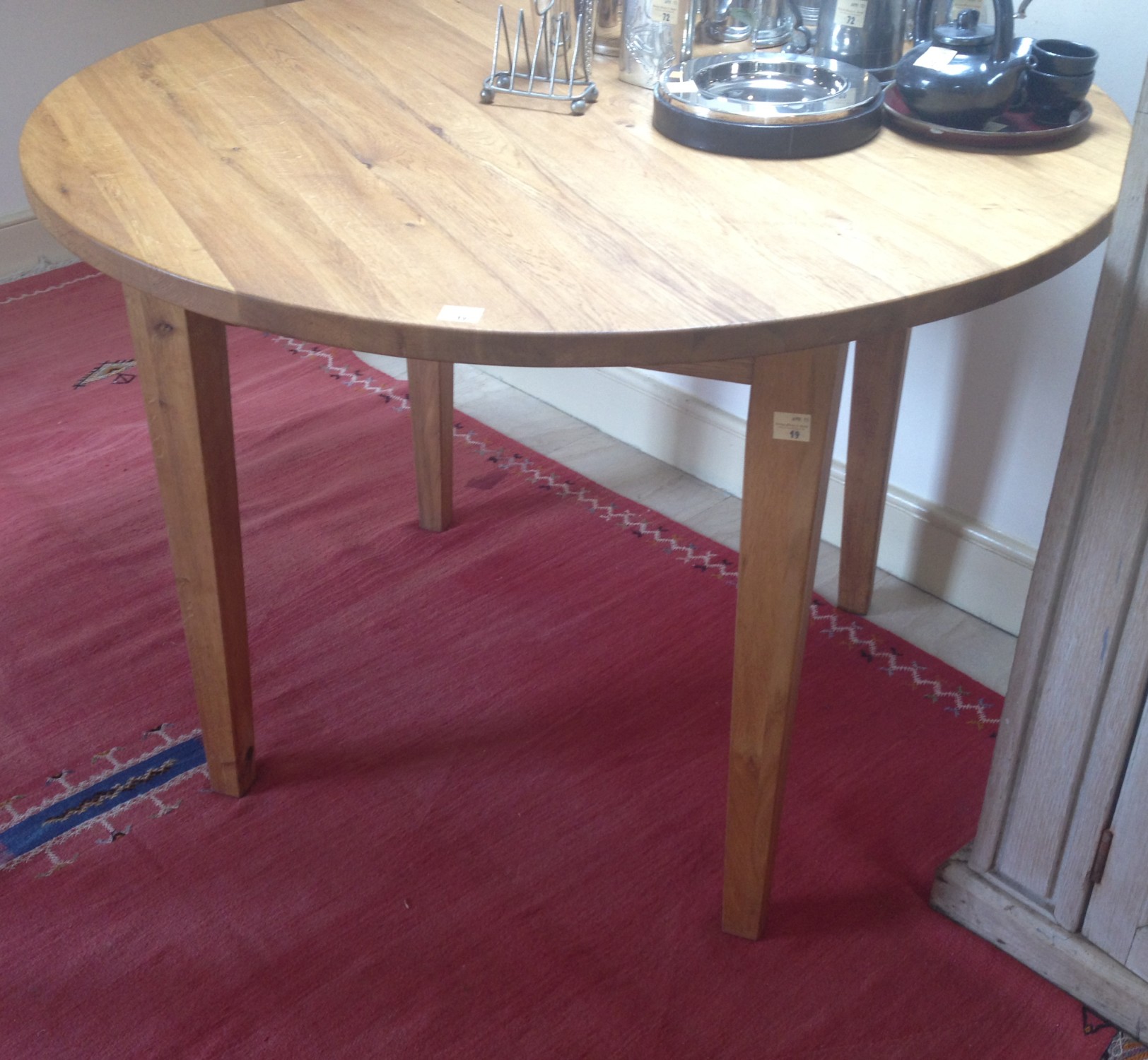 A heavy modern oak circular Table. (1)
Also includes: four modern oak Chairs (two folding).