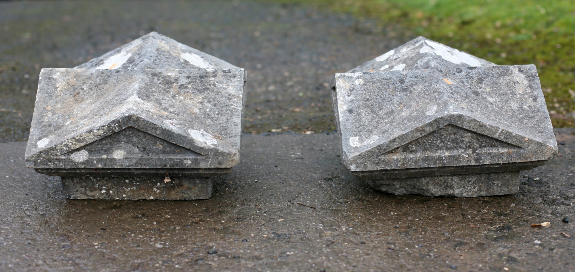 A pair of carved square shaped limestone Pillar Caps. (2)