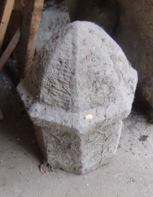 A part octagonal limestone Ornament. (1)