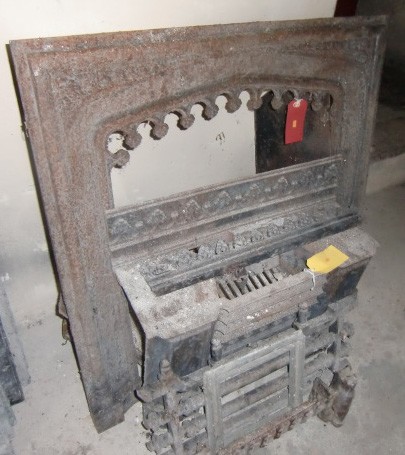 An antique Gothic designed metal Fire Surround, and a matching metal Fire Grate. (2)