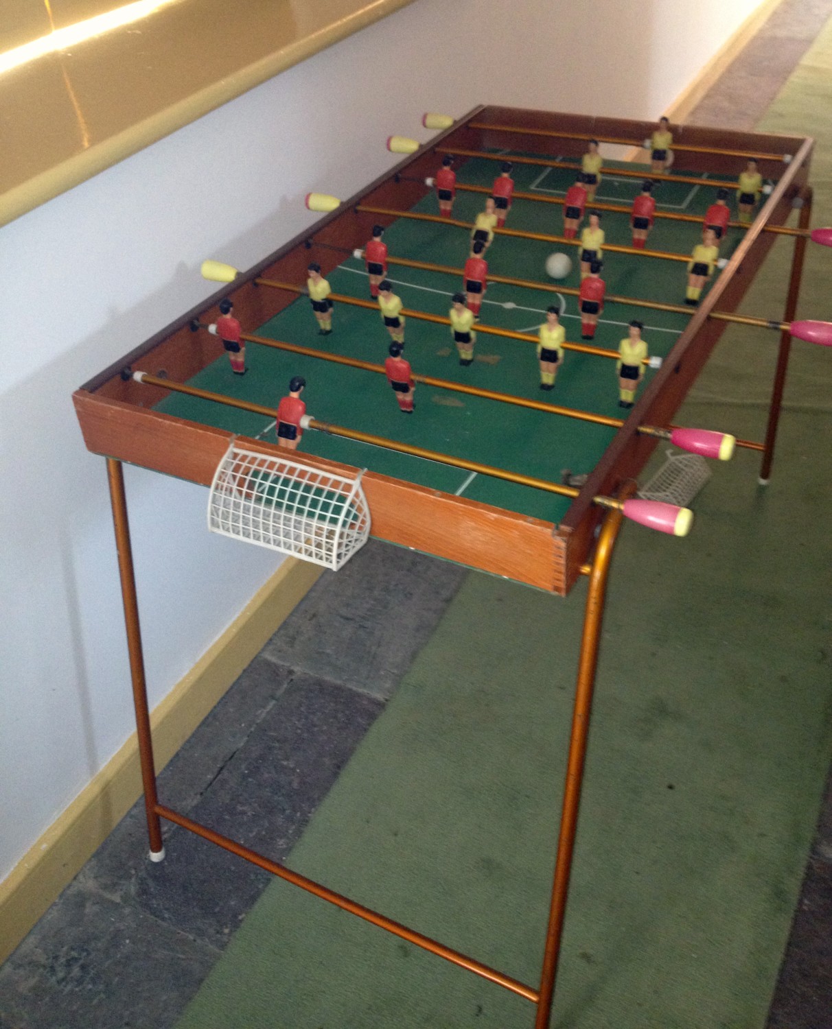 A Table Soccer Game, on tubular legs. (1)